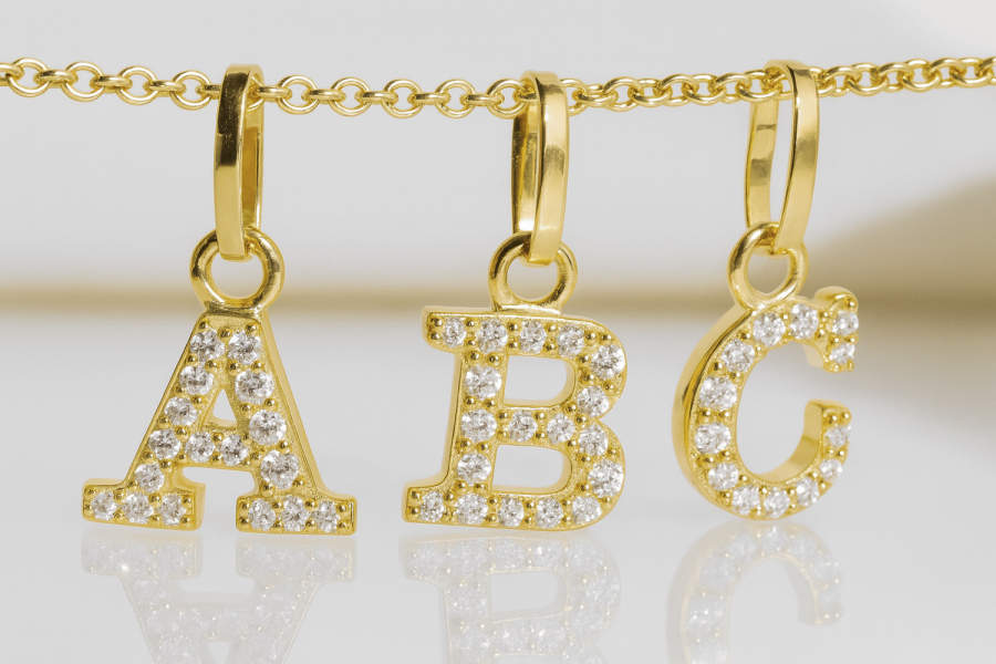 Buchstabenanhänger mit Zirkonia Gold 333/000